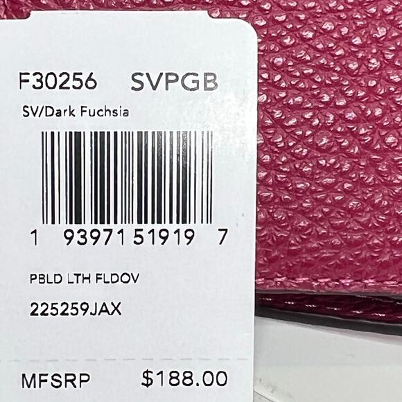 Coach Foldover Crossbody Clutch in the color Dark Fuchsia leather w/ charm NWT - Picture 10 of 13